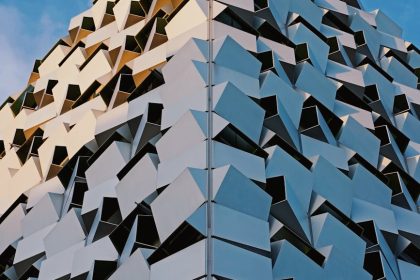 Innovative geometric building exterior in Sheffield, UK basking in sunlight.