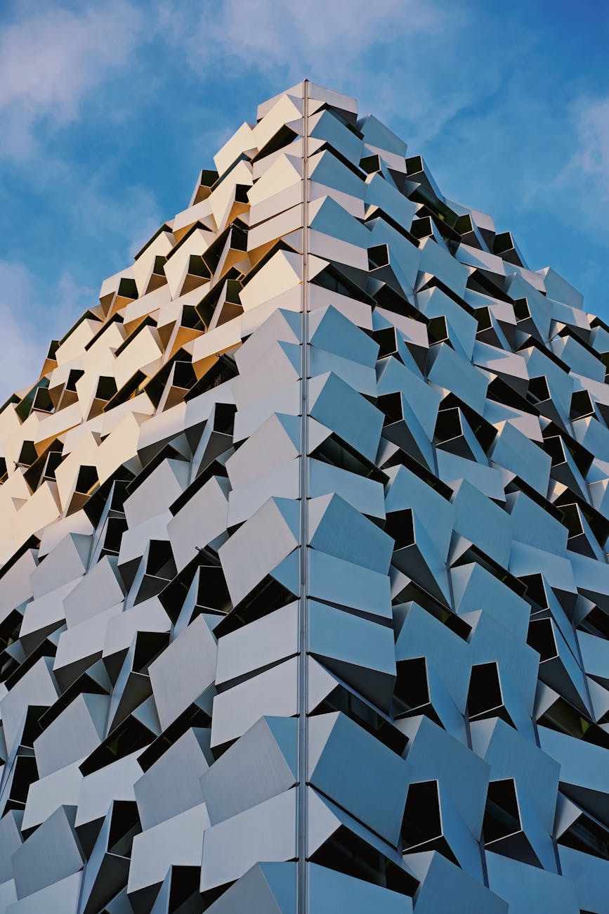Innovative geometric building exterior in Sheffield, UK basking in sunlight.